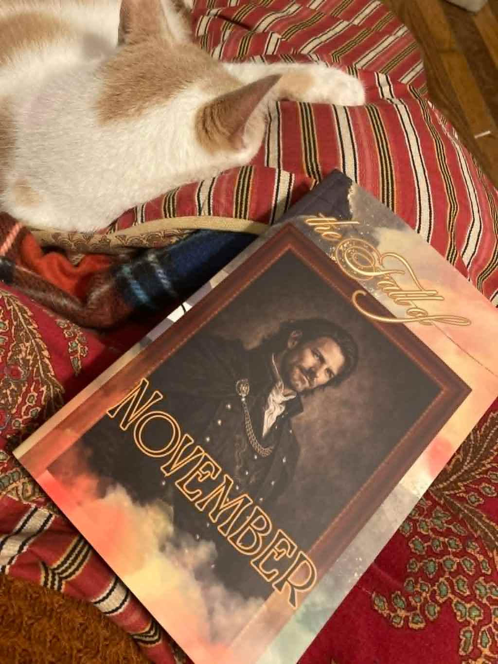 Boo with a copy of November